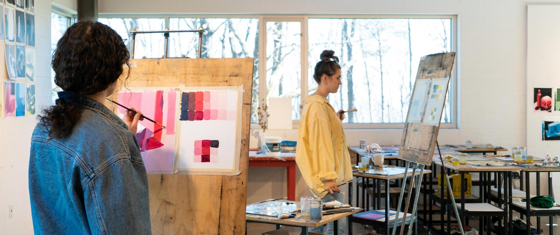 students painting in studio